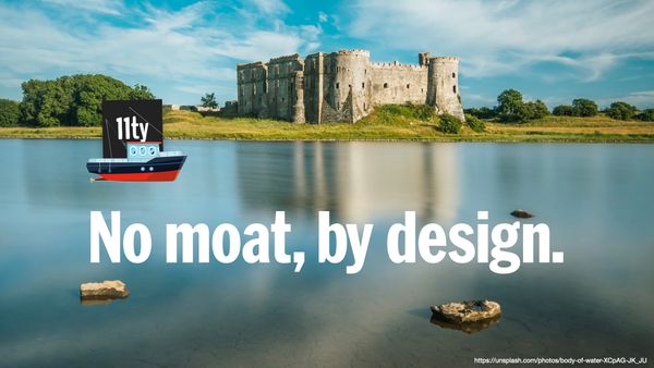 No moat, by design. The 11ty logo sits in a boat in front of a castle
